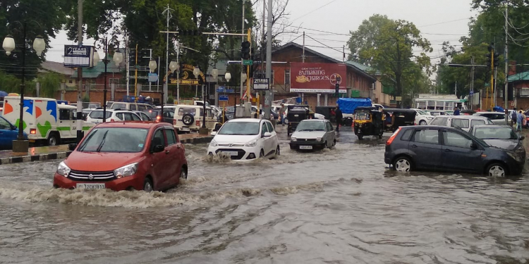 Rains bring relief as schools reopen after summer break in Kashmir Valley