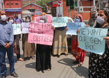 Missing Bemina scholar’s family protest to seek his whereabouts