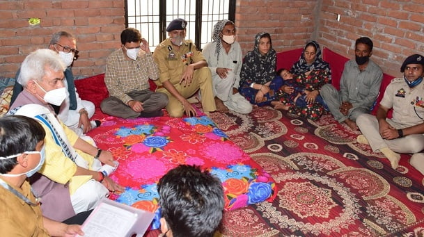 Lt Governor visits families of three Rajouri youth killed in Shopian; assures justice