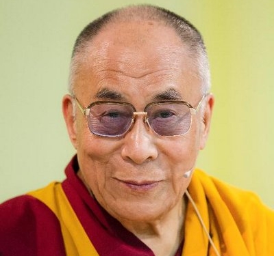 Dalai Lama apologises in child kissing row